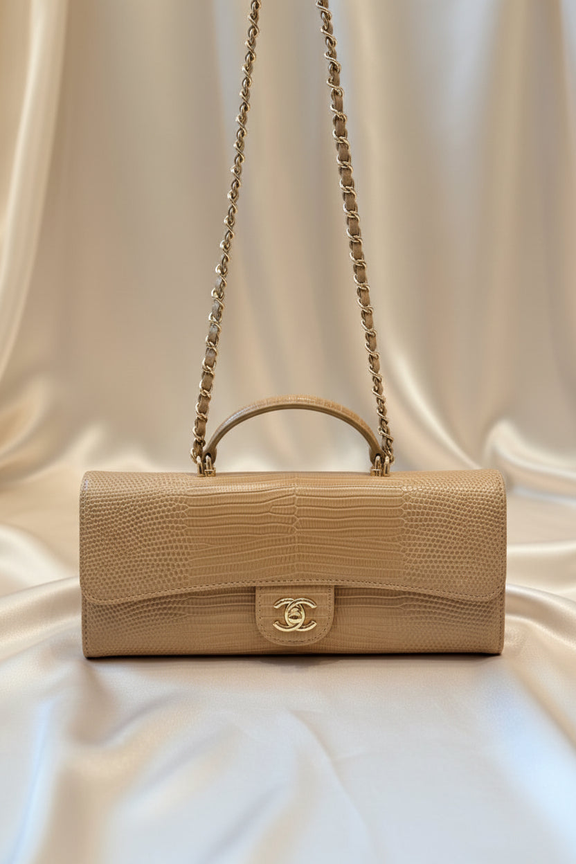Lizard-embossed leather clutch