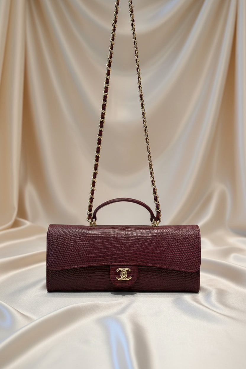 Lizard-embossed leather clutch