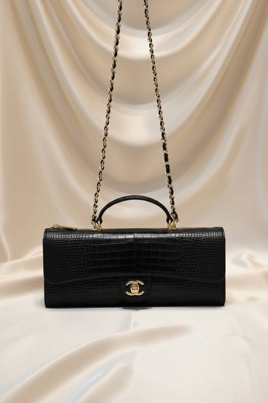 Lizard-embossed leather clutch