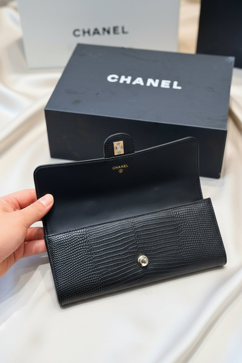Lizard-embossed leather clutch