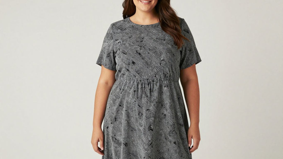 Plus size A-line dress on a smiling woman.