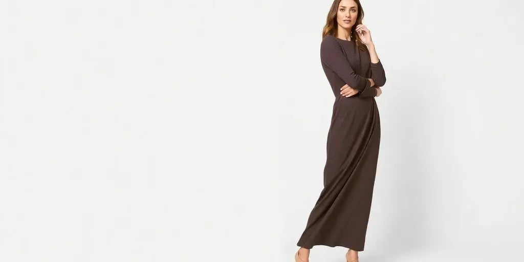 Woman wearing a long-sleeved midi dress.