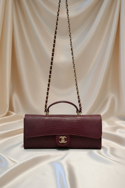Lizard-embossed leather clutch