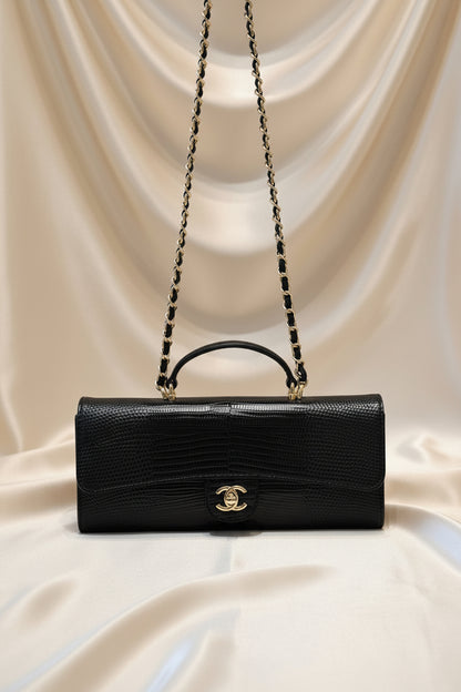 Lizard-embossed leather clutch