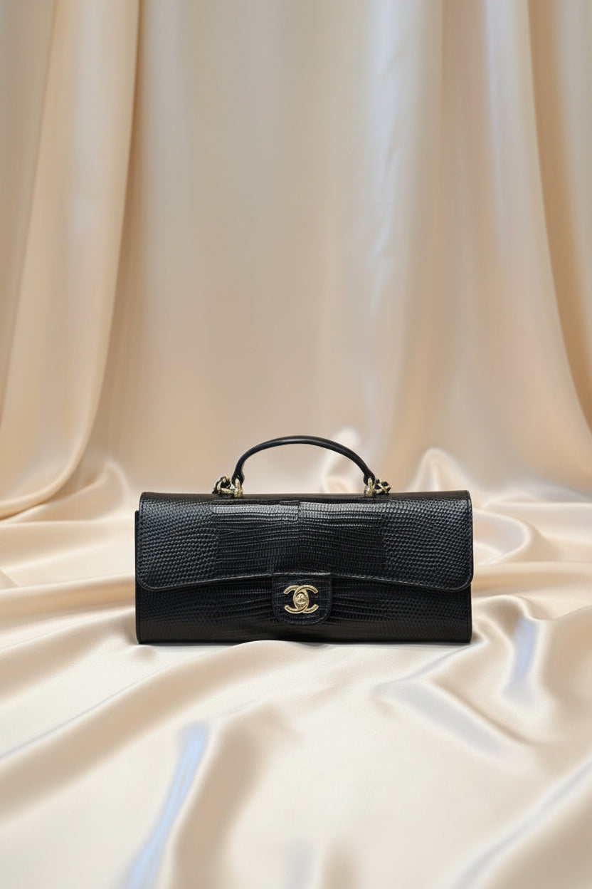 Lizard-embossed leather clutch