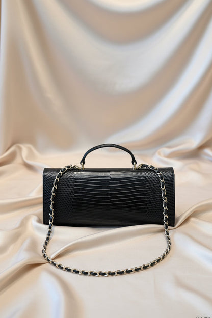 Lizard-embossed leather clutch